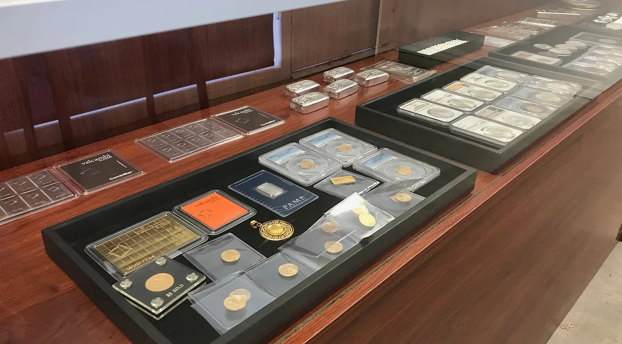 Palos Verdes Coin Exchange - Our Display Case - an example of a typical display with gold, silver, bullion, coins, certified coins